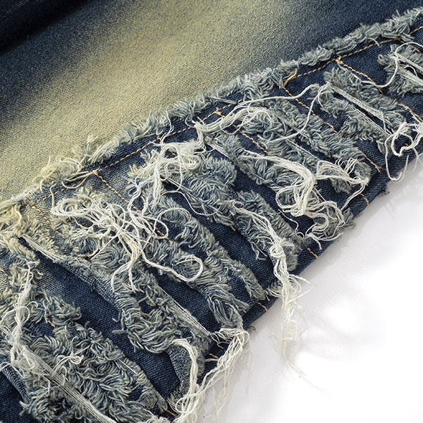 FRINGE BORDER FLARE DENIM PANTS