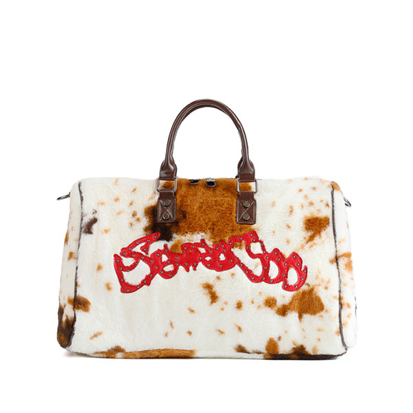COW FUR TRAVEL BAG